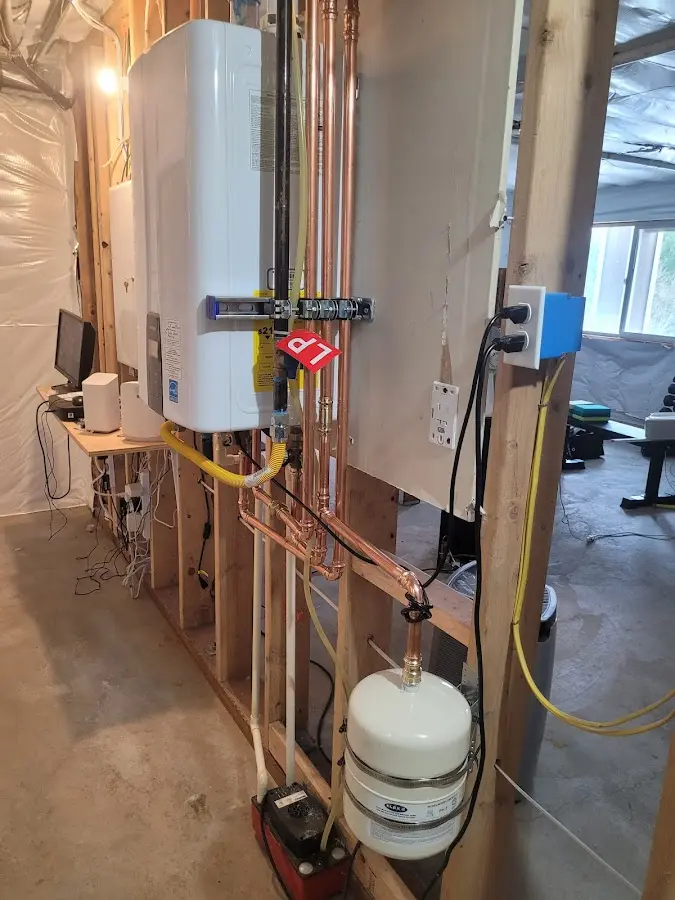 Licensed plumber repairing a kitchen sink in Dellwood